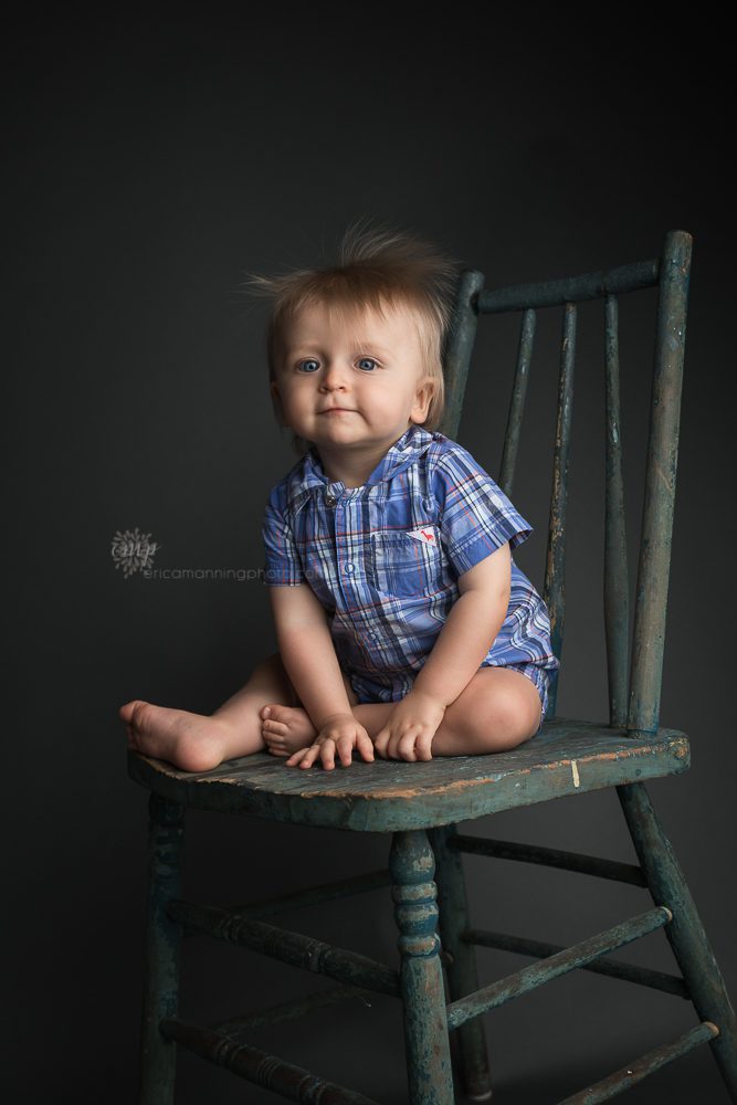 One year old boy on chair