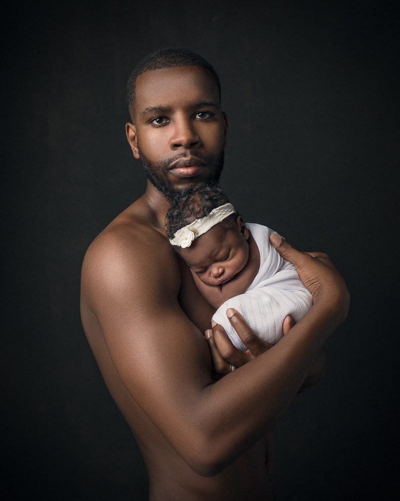 newborn with father