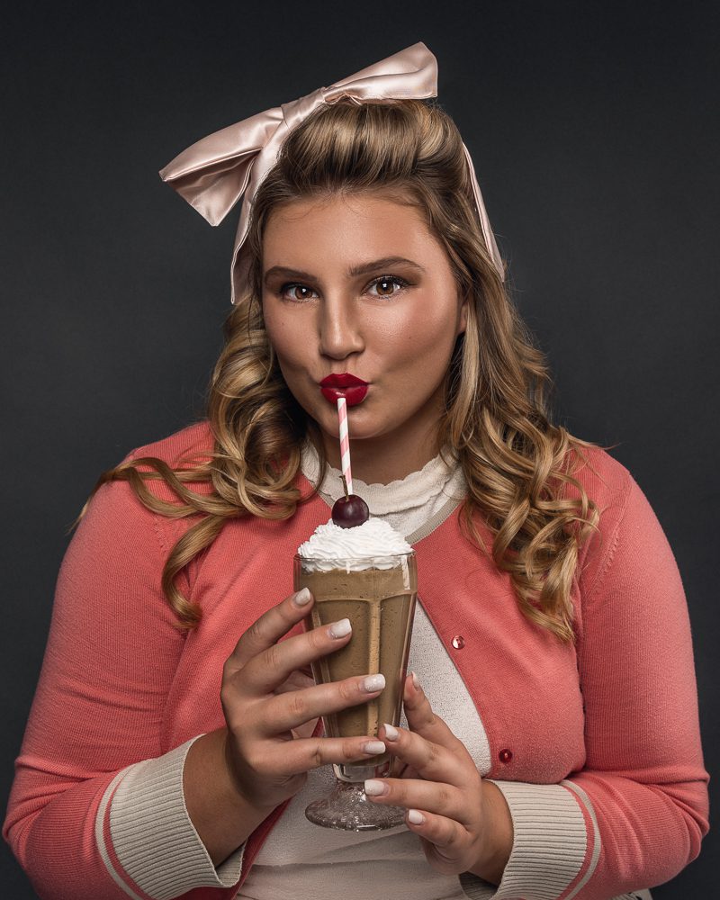 1950s teen girl with milkshake creative portrait