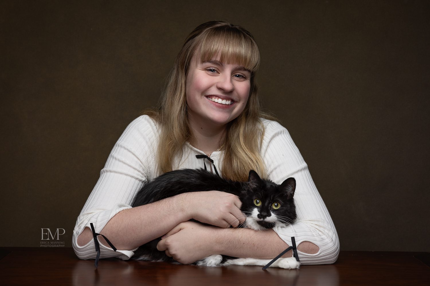 High school senior girl with cat